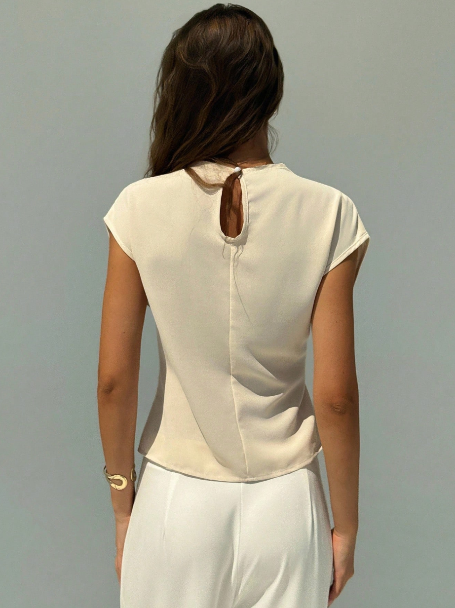 Minimalist Apricot Blouse with Capped Sleeves, Cinched Waist & Metal Detail – Women’s Office Wear