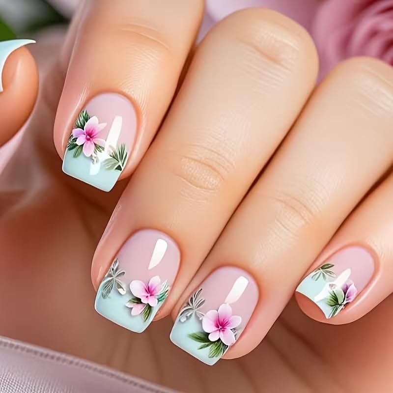 Nails with floral design on a neutral background
