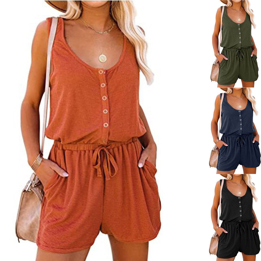 Three women wearing sleeveless button-up tops and shorts in different colors.