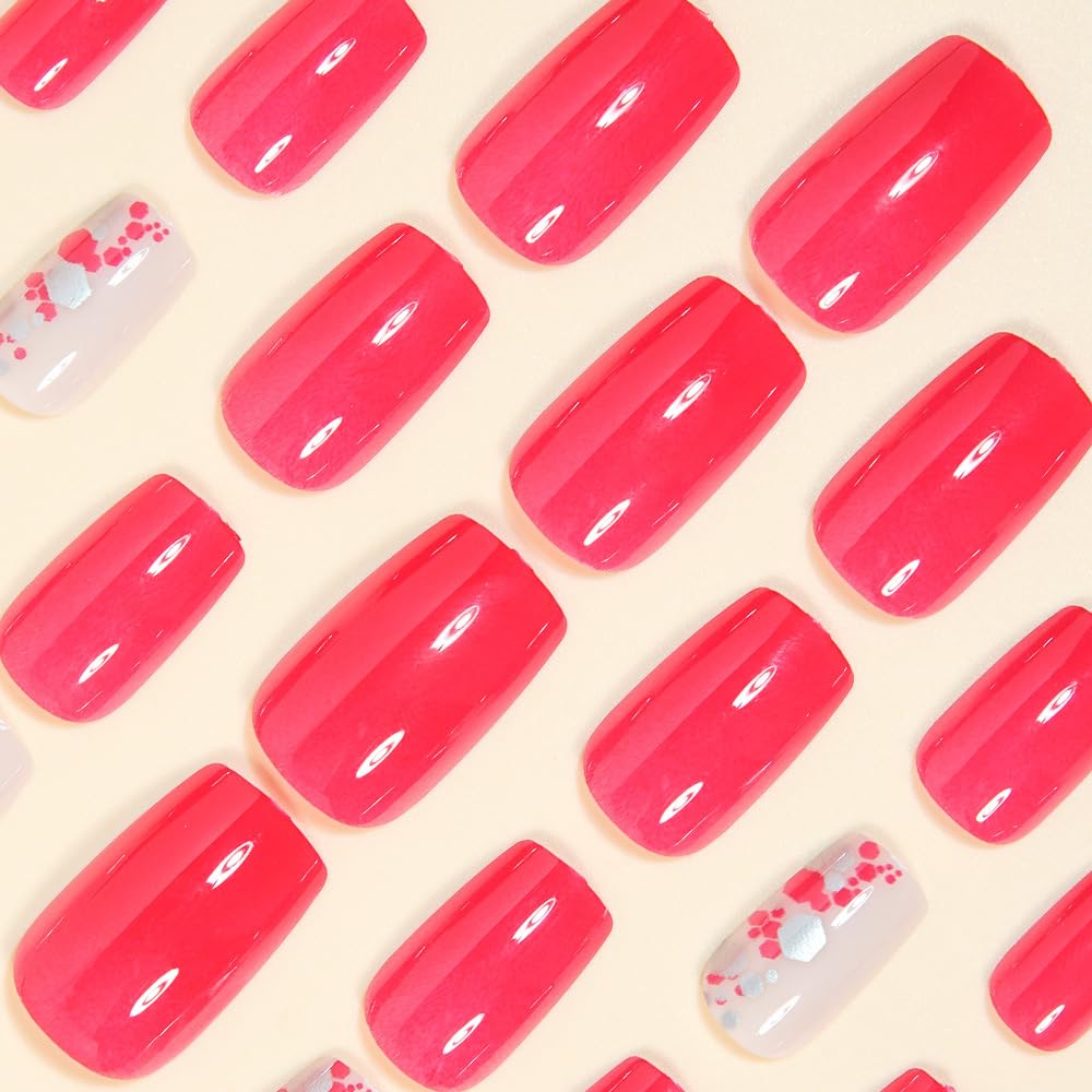 Pattern of red nail polish on a beige background