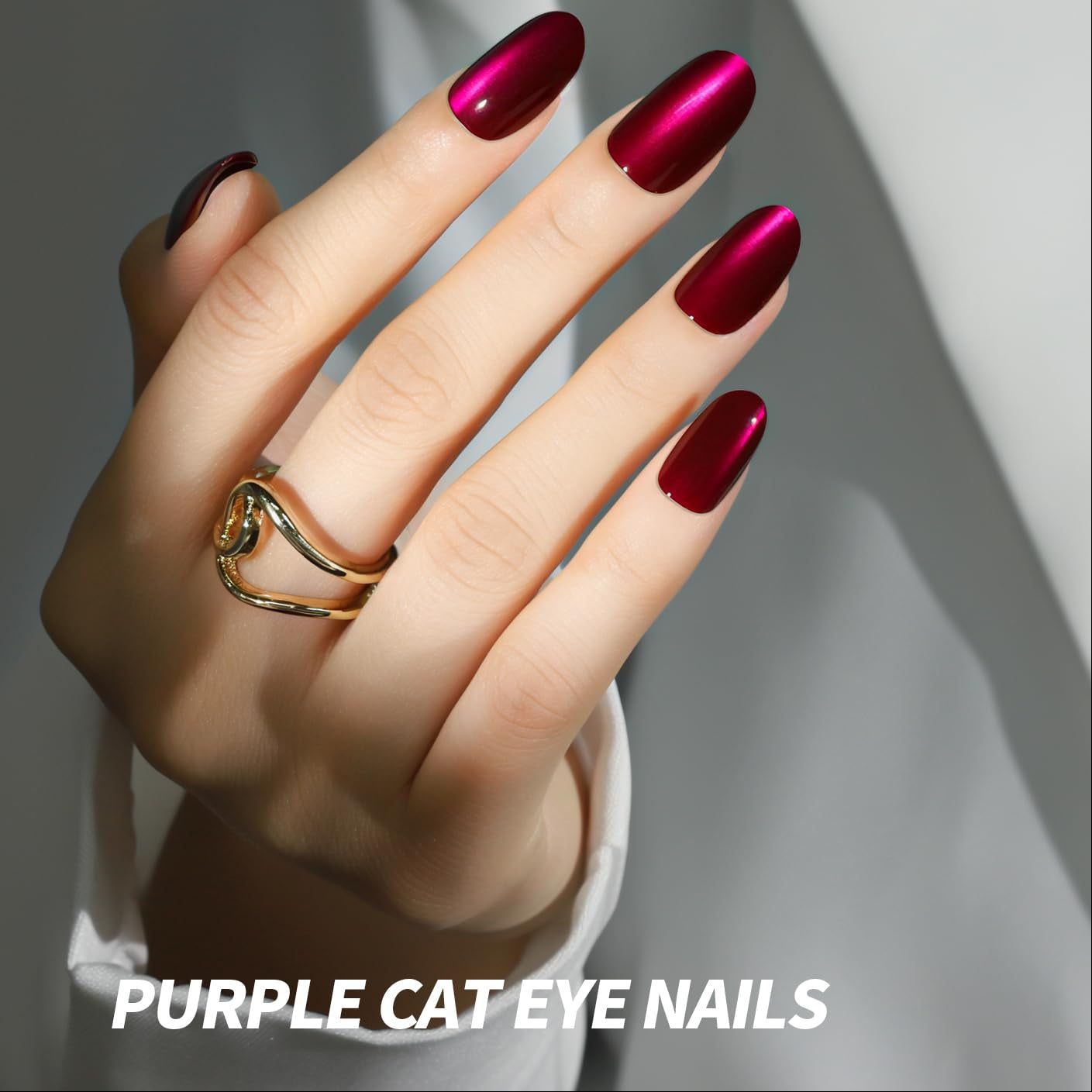 Hand with purple cat eye nail polish on a neutral background, featuring the brand 'Pandamei'.