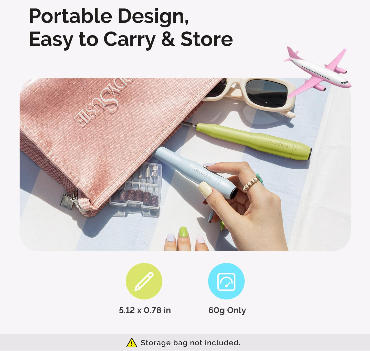 Portable nail drill set with pink pouch, sunglasses, and airplane model on a white background.