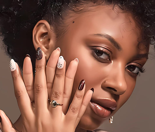 Woman with stylish nails and jewelry, with 'LPODDNU Nails' branding.