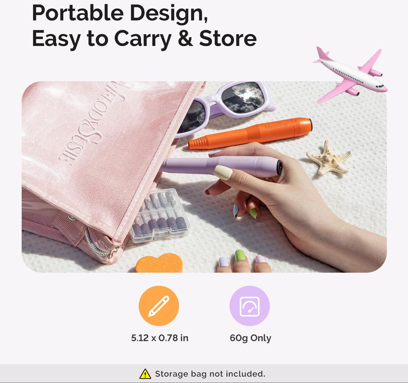 Portable nail drill set with pink pouch, orange handle, and hand holding a purple tool on a white background.